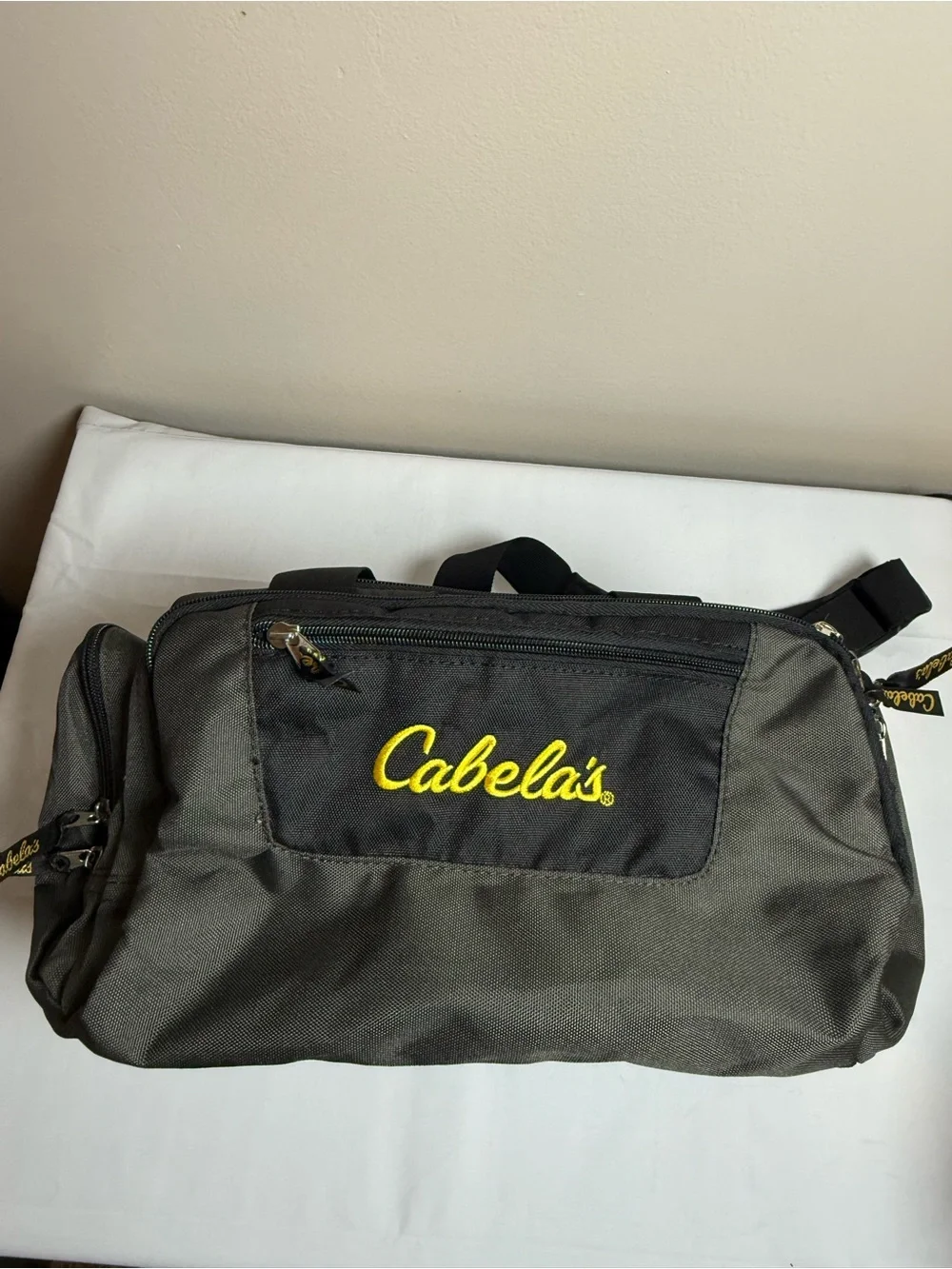 Cabela's Olive Green and Black Duffel Bag with Yellow Logo